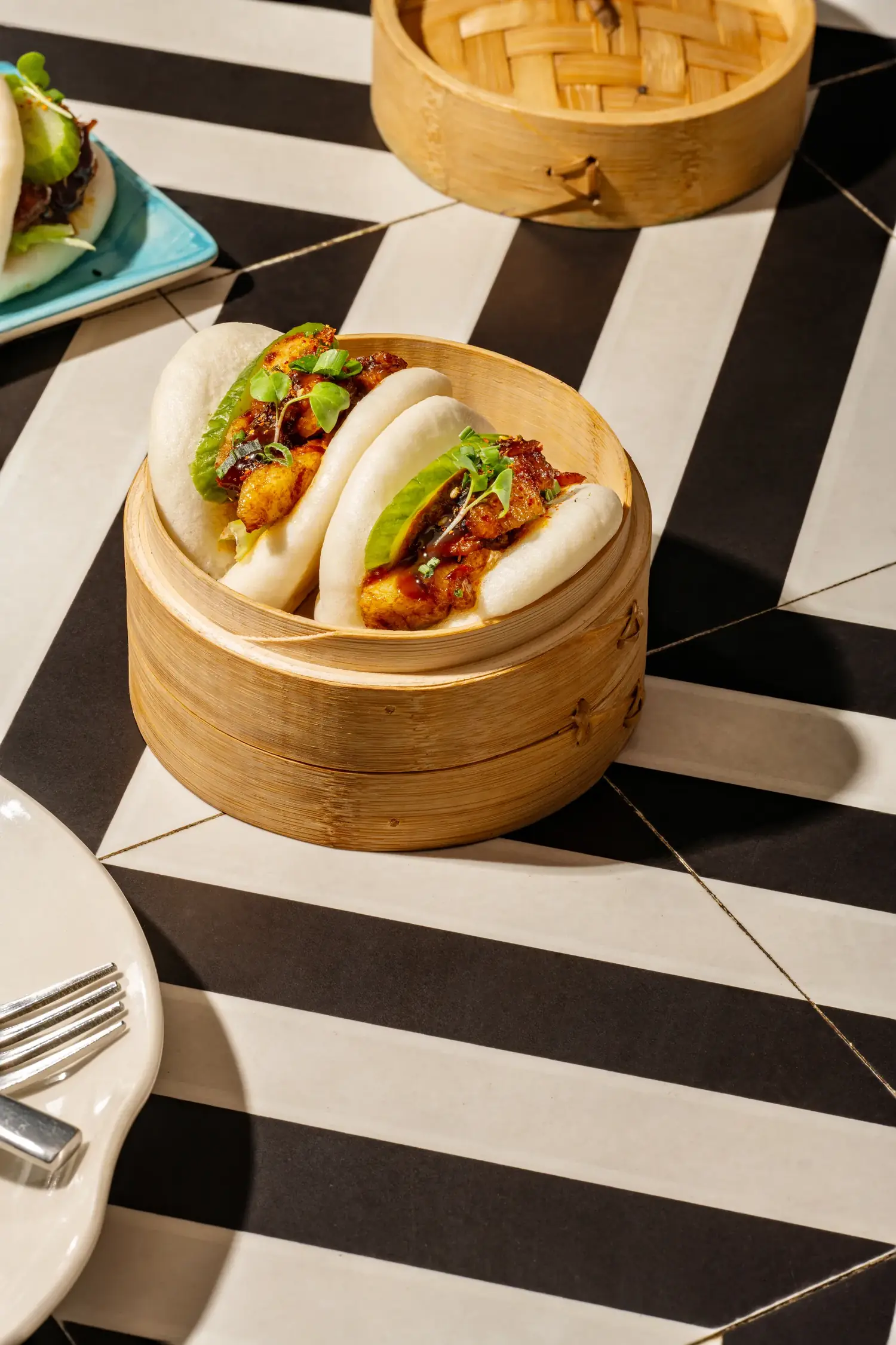 Char Siu Pork Open Bao in a bamboo steamer